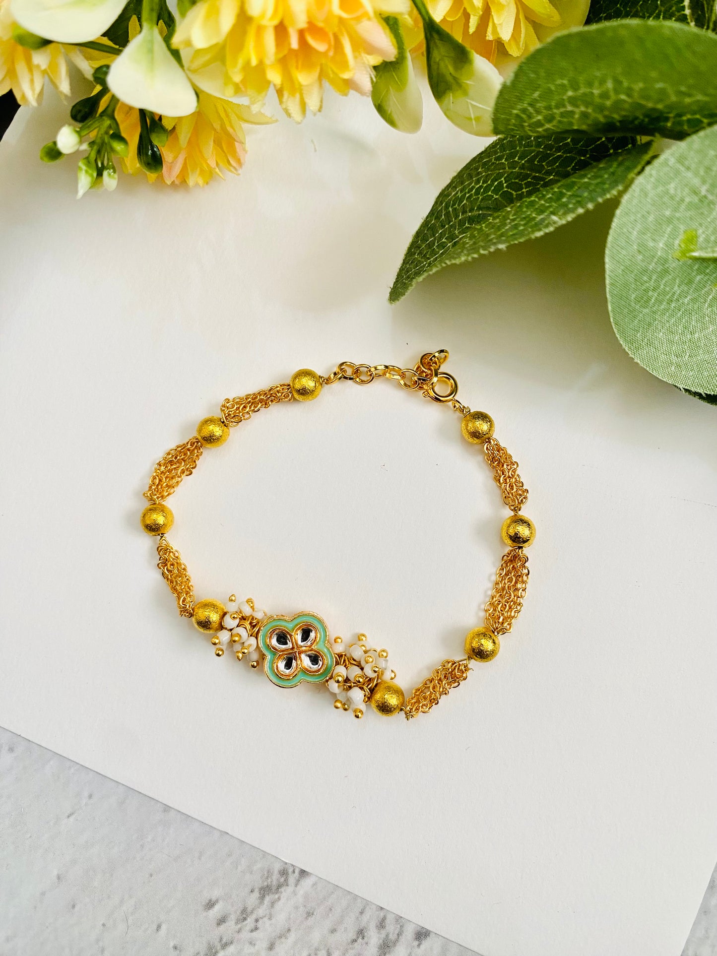 Four petal flower Meena Kundan Bhabhi Rakhi