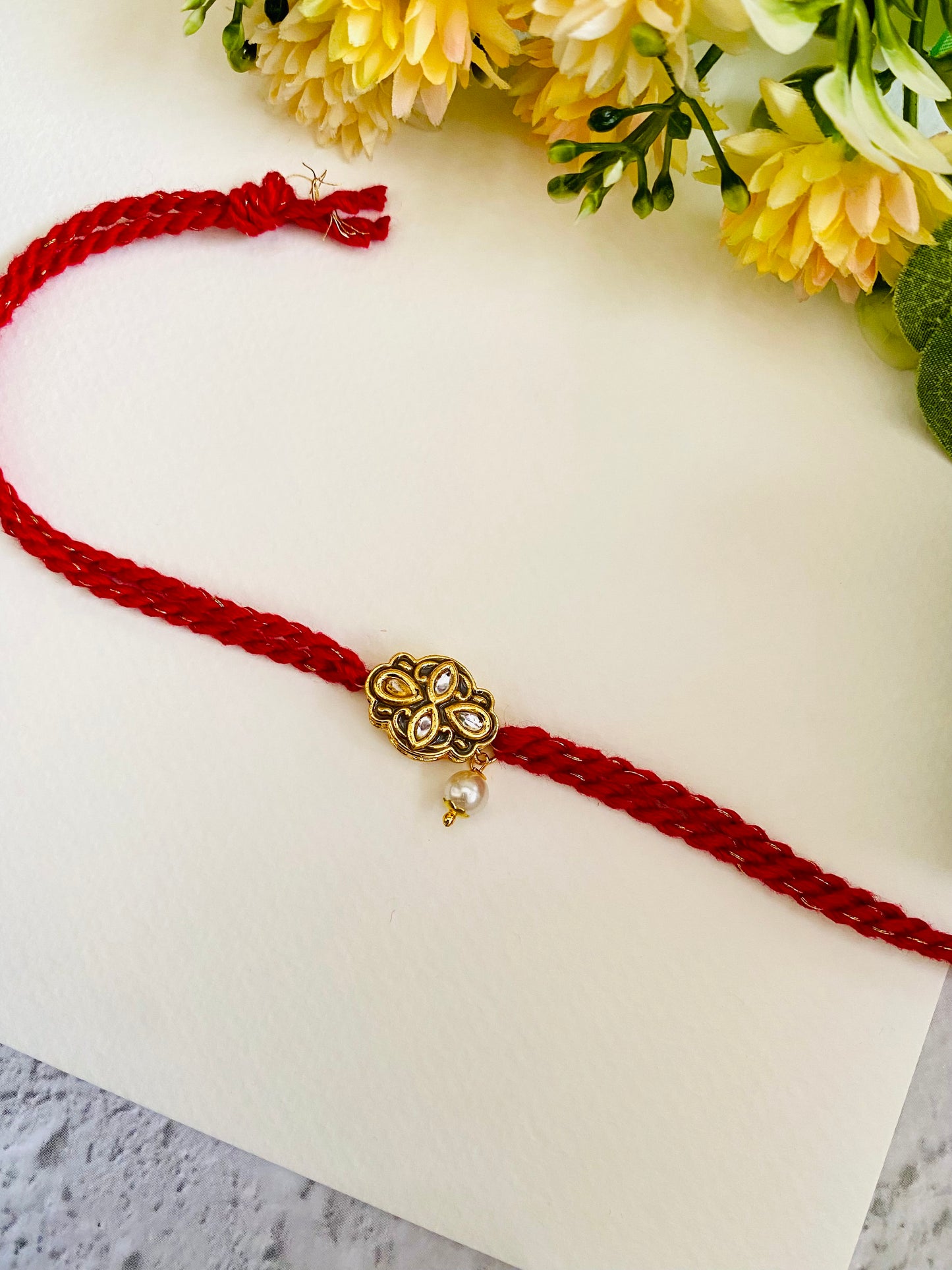 Grey And Red Meena Kundan Bhabhi Rakhi