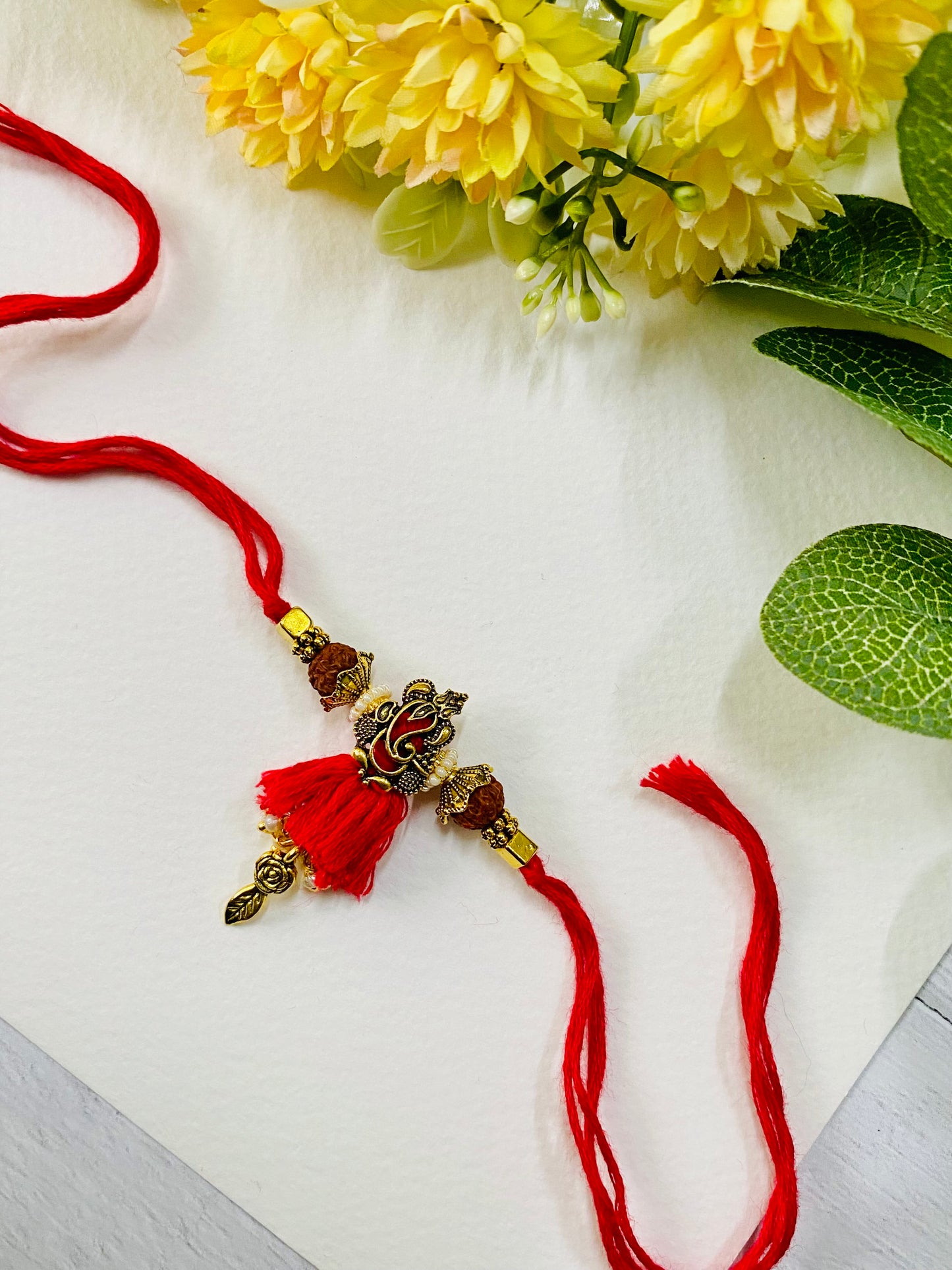Ganesha Flower Bhabhi Rakhi