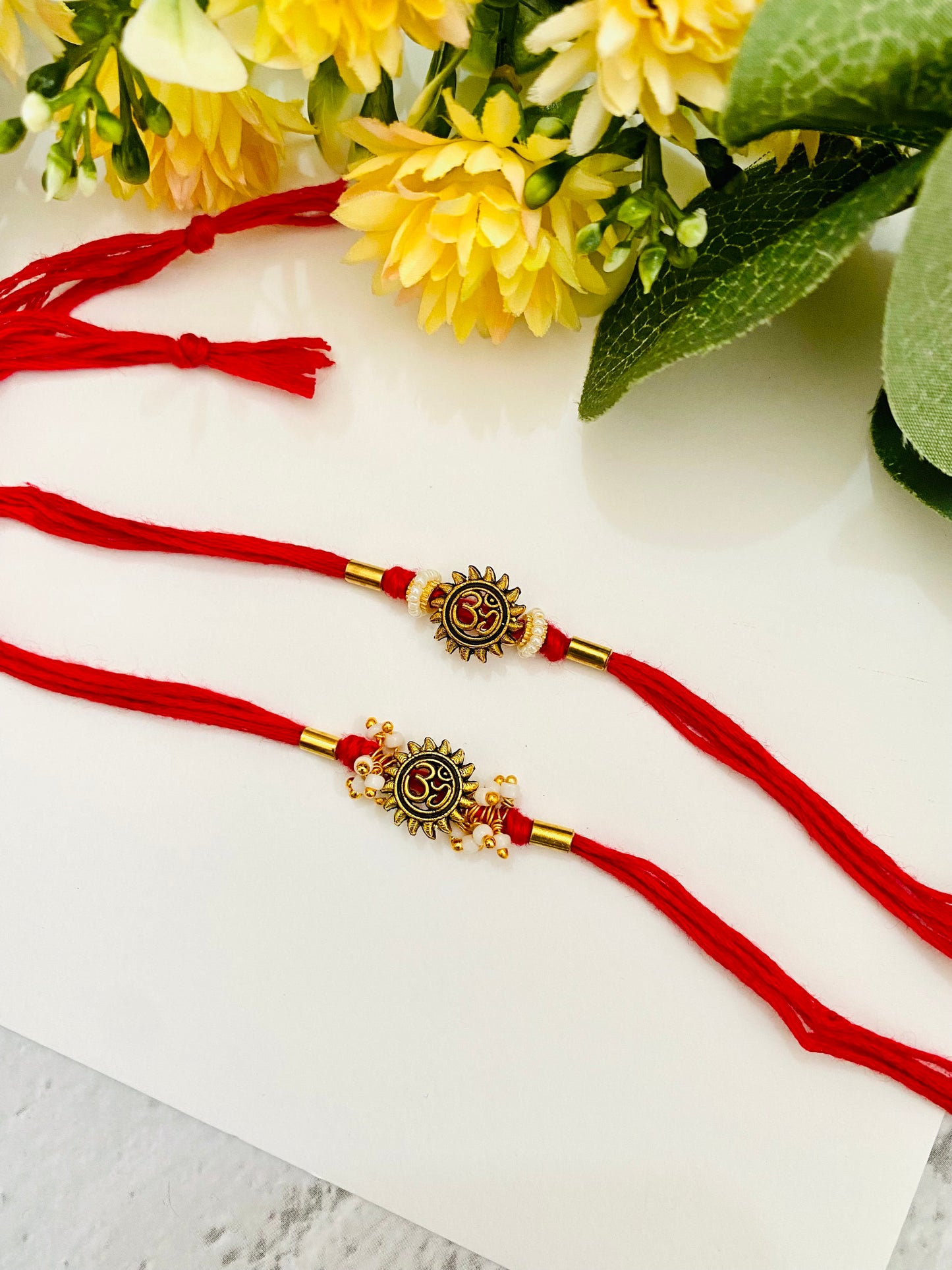 Om Sun pipe bead bhai bhabhi rakhi set