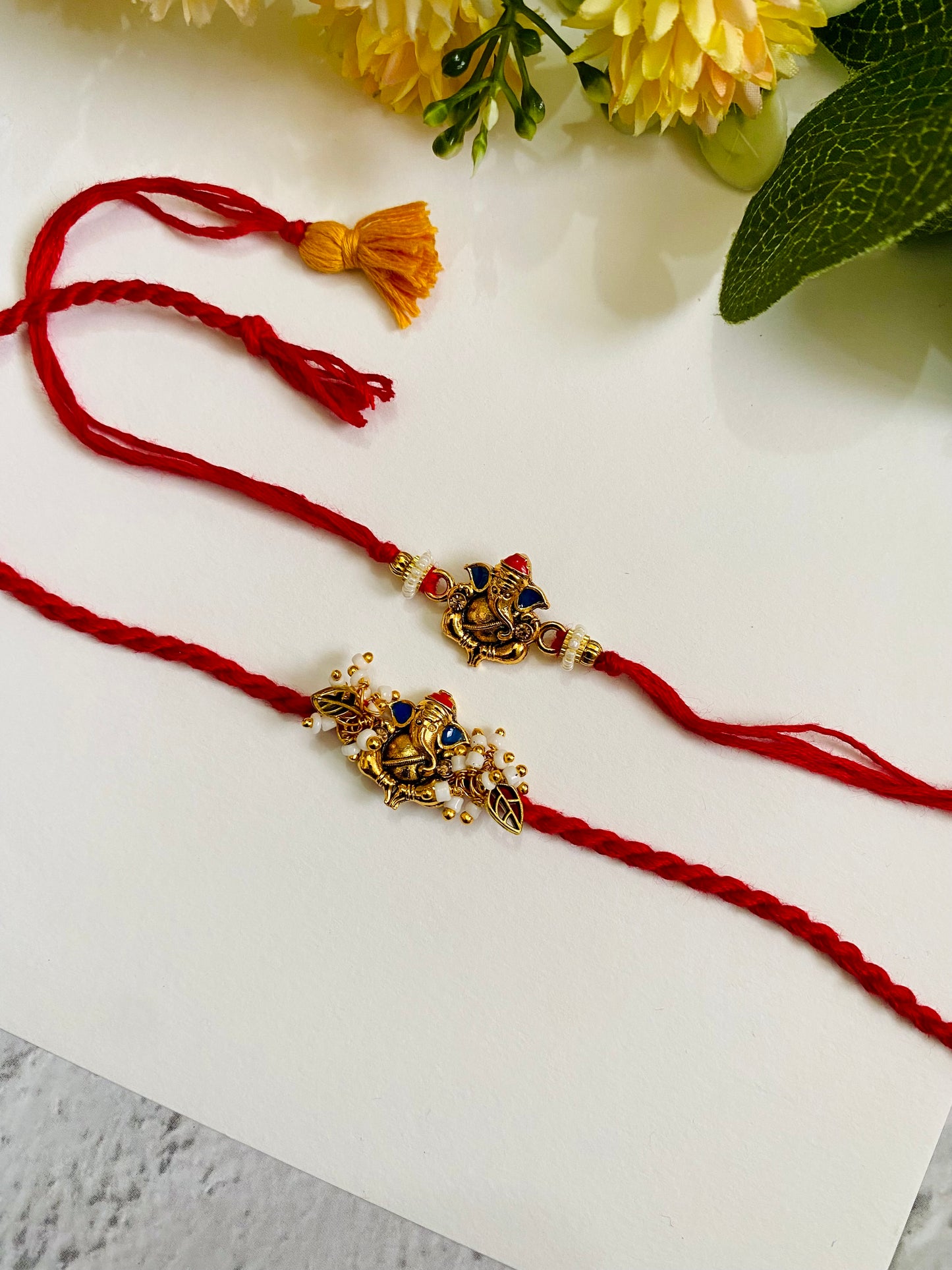Ganesha Divine Bead Bhai Bhabhi Rakhi Set