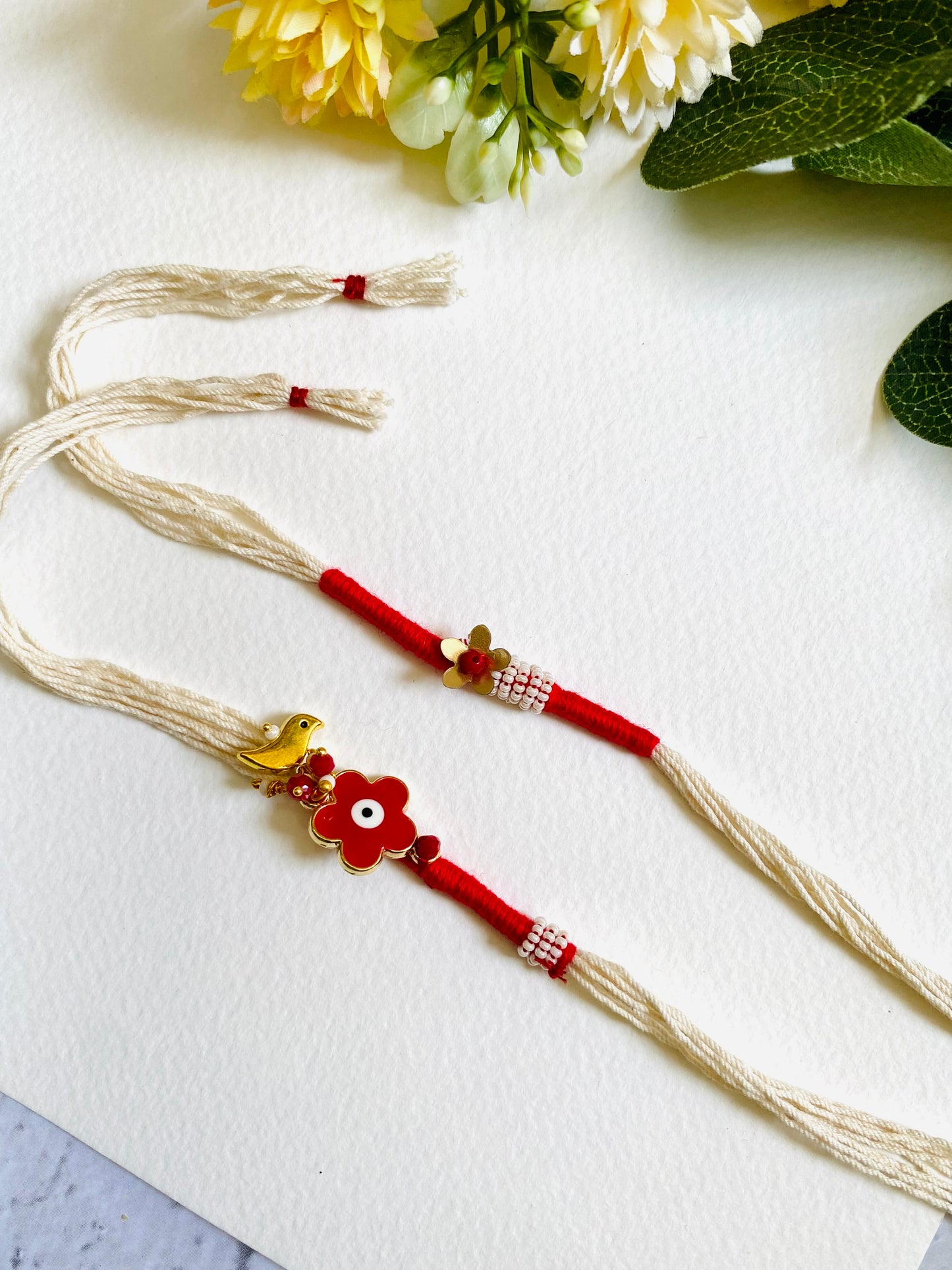 Flower Evil Eye Charm Bhai Bhabhi Rakhi Set