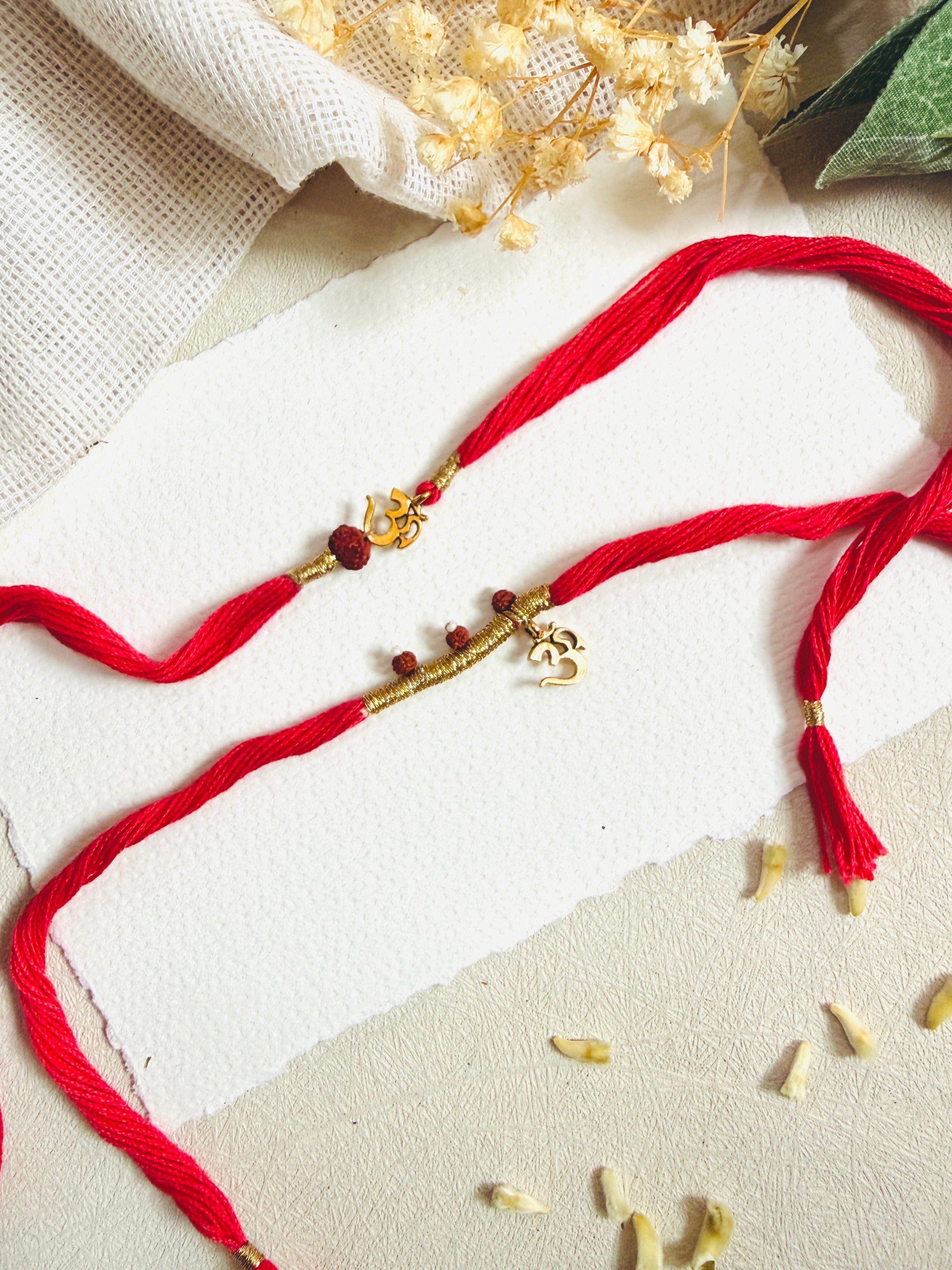 Sacred Om Bhai Bhabhi Rakhi Set