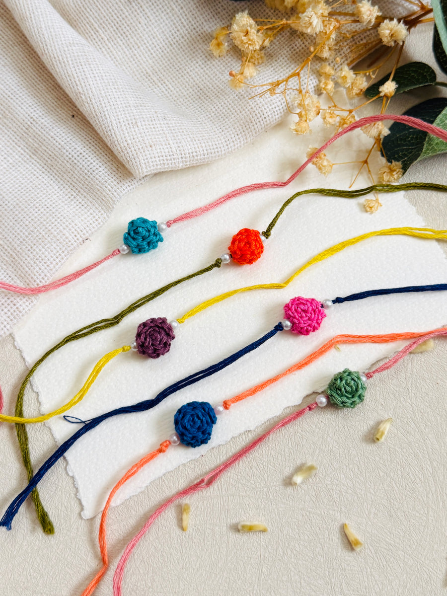 Rose Crochet Bhagwan Rakhi (Multi colour - 1 piece)