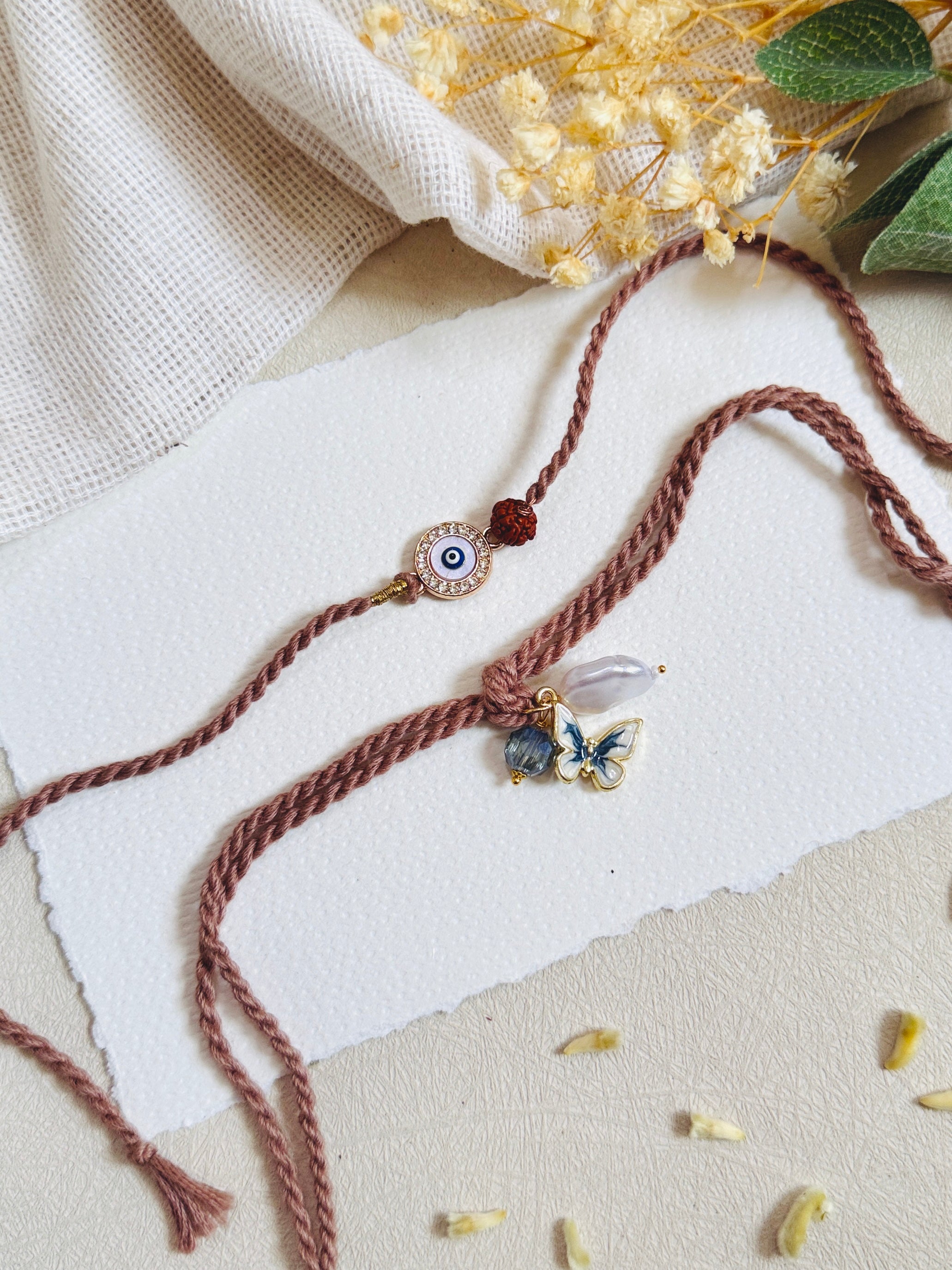 Mystic Evil Eye And Butterfly Charm Bhai Bhabhi Rakhi Set
