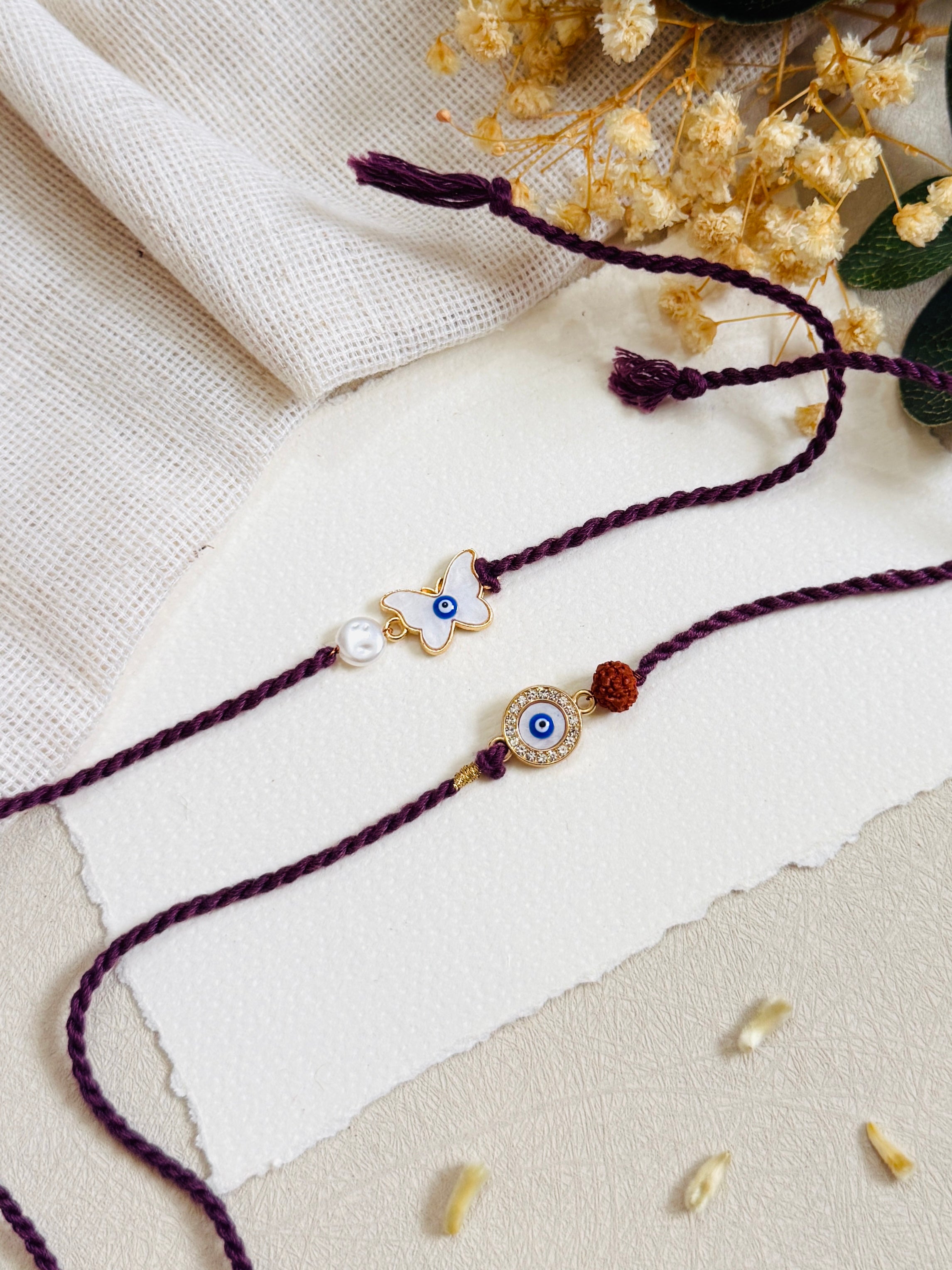 Mystic Evil Eye  And Butterfly Bhai Bhabhi Rakhi Set