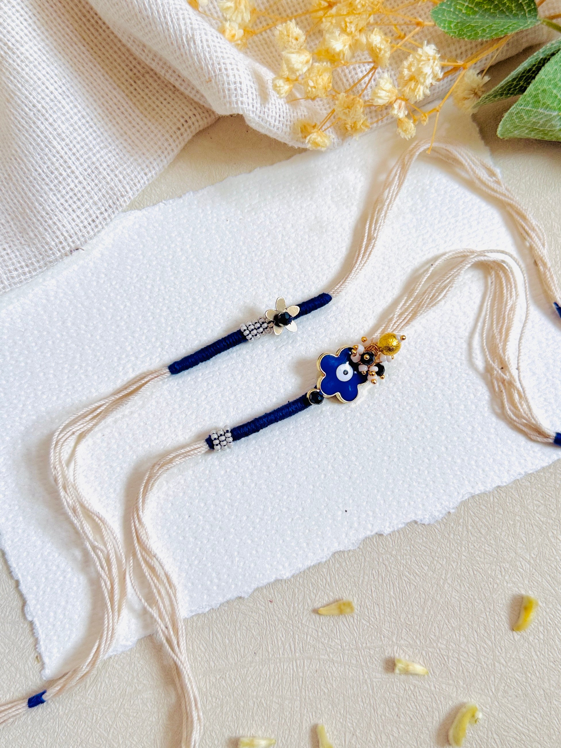 Flower Evil Eye Charm Bhai Bhabhi Rakhi Set
