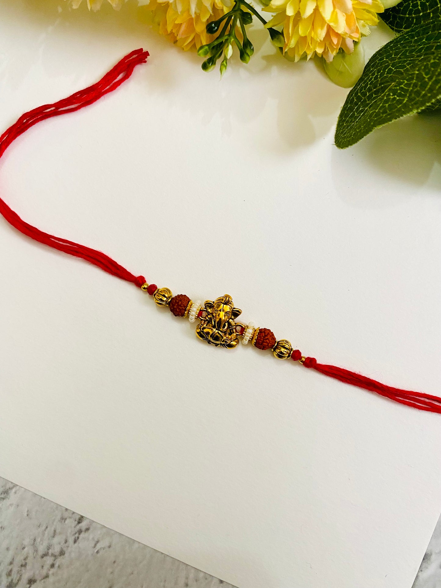 Tabla ganesha bead bhai rakhi