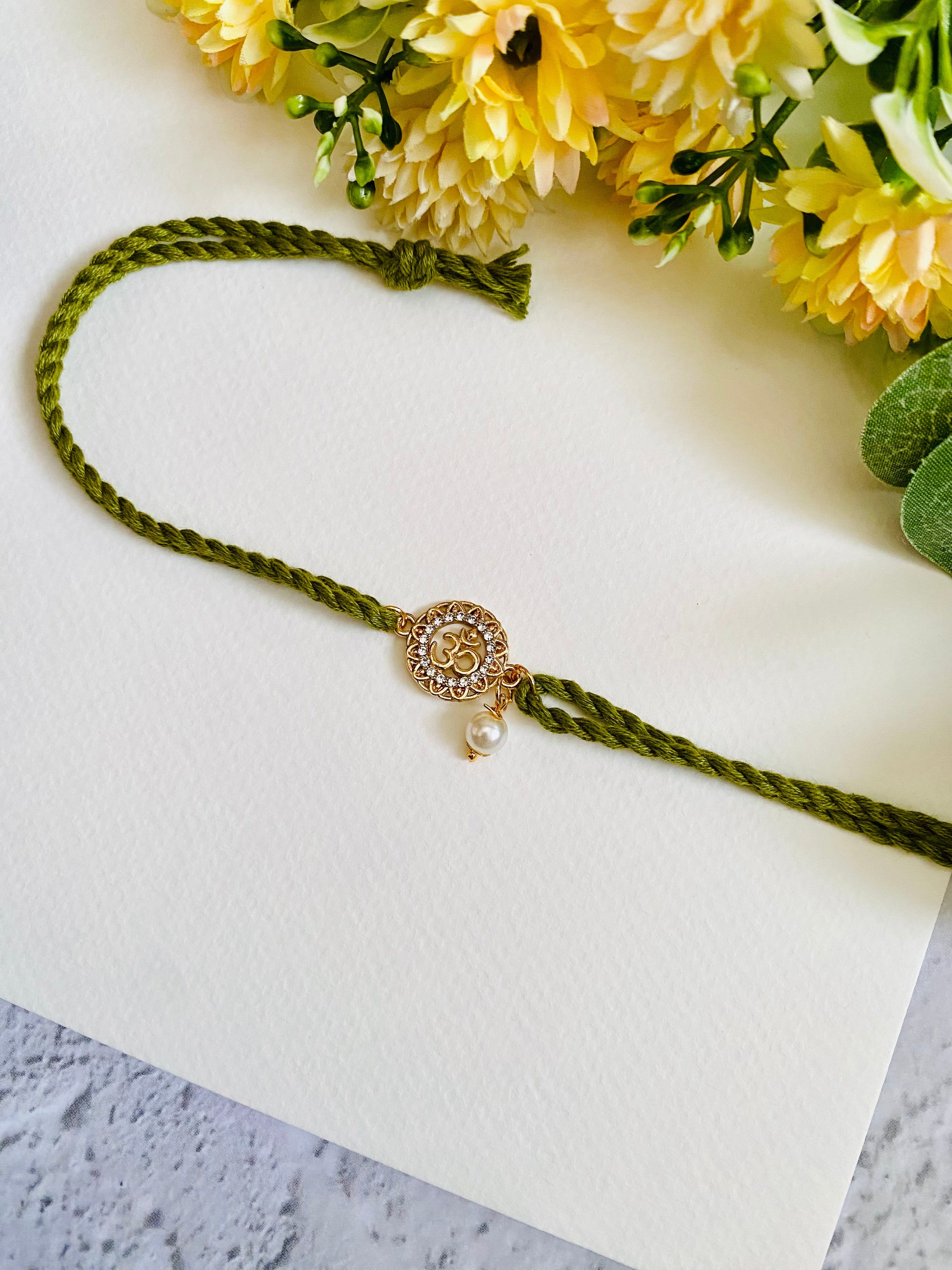 Om Flower twist bhabhi rakhi