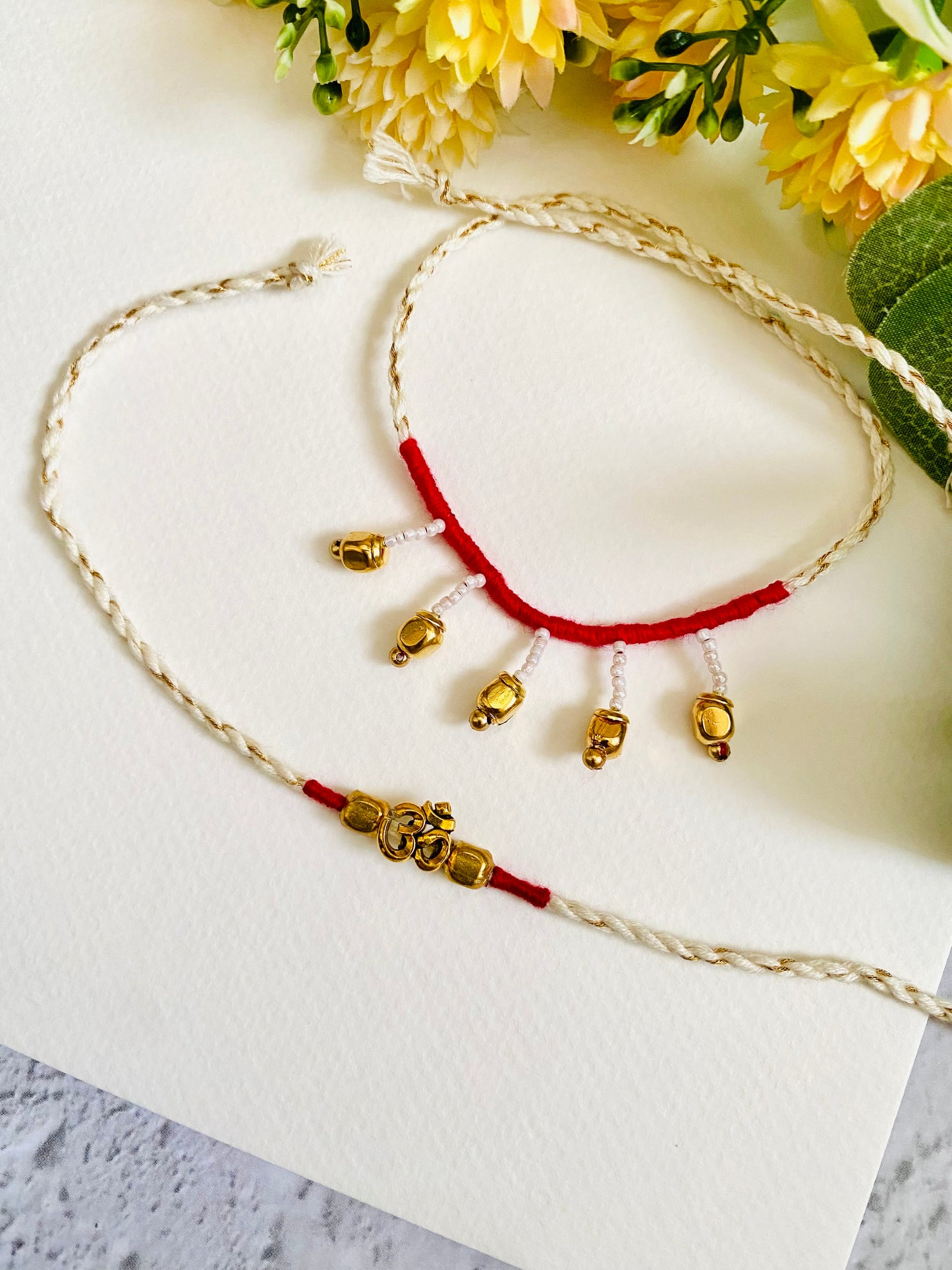 Om Small Bhai Bhabhi Rakhi Set