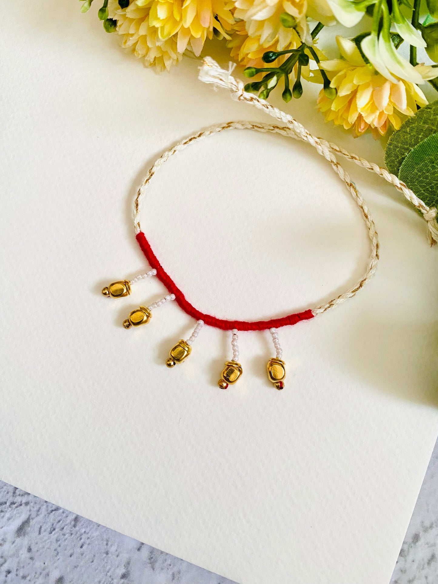 Dangling Golden Beads Bhabhi Rakhi