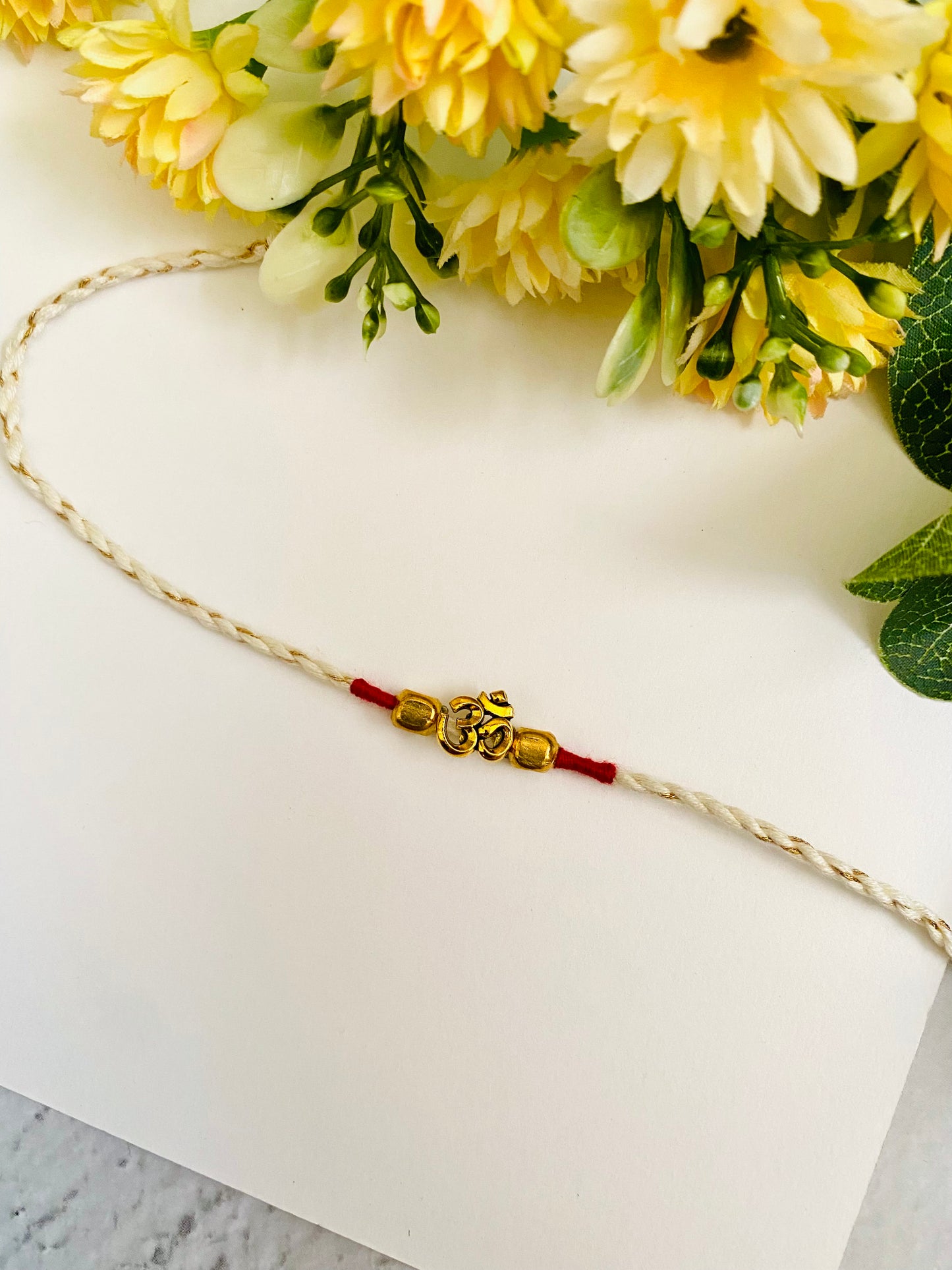 Om Small White Dori Bhai Rakhi