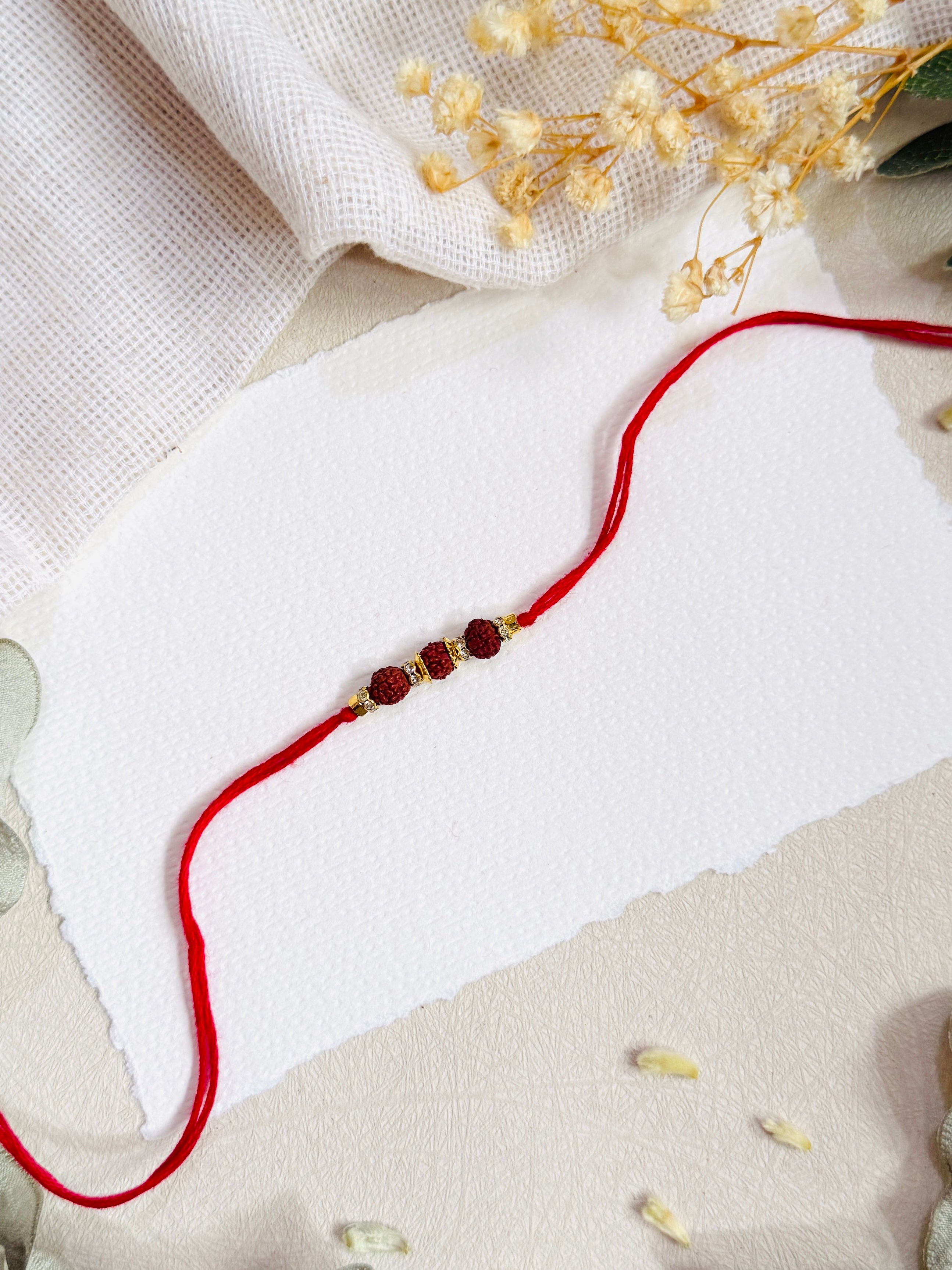 3 Rudraksha And Diamond Rakhi
