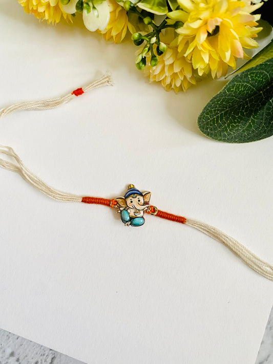 Ganesha white dori Kids Rakhi
