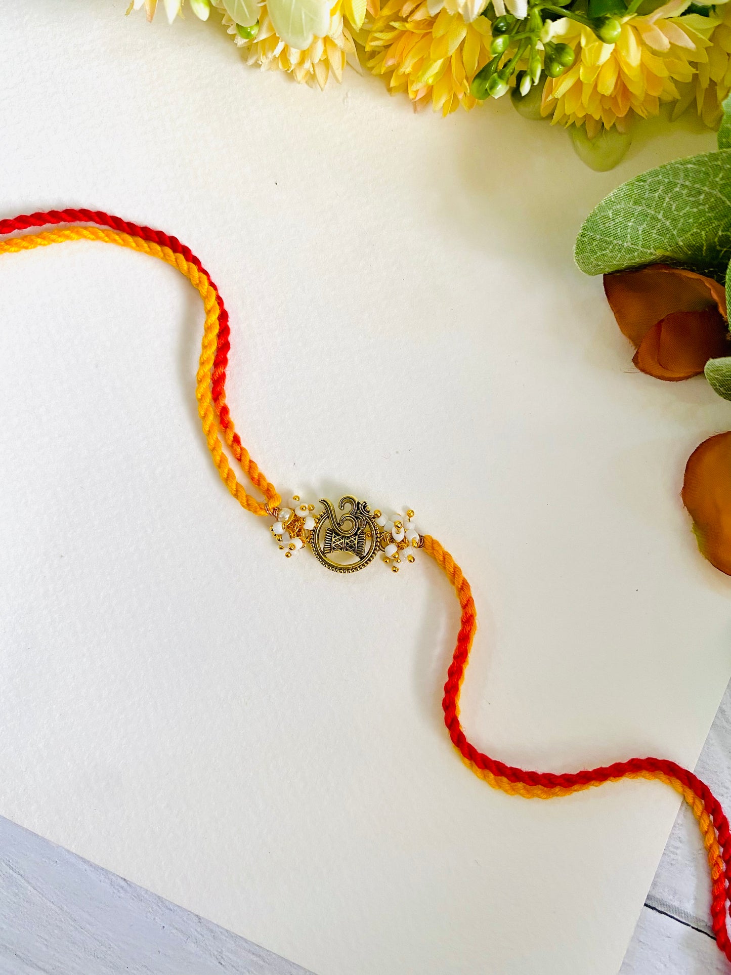 Om Damaru Red Yellow Bhabhi Rakhi