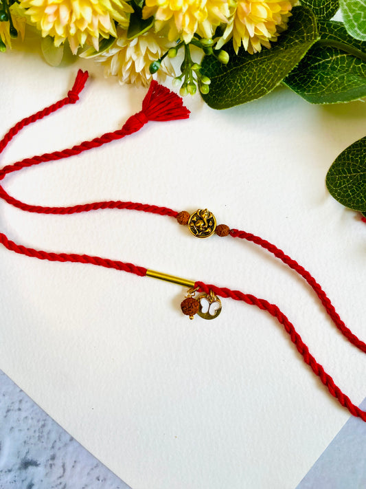 Ganesha Embossed Twisted Dori Bhai Bhabhi Rakhi Set