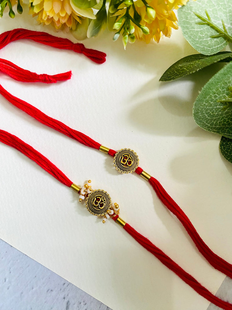 Om Beads and Pipe Bhai Bhabhi Rakhi Set