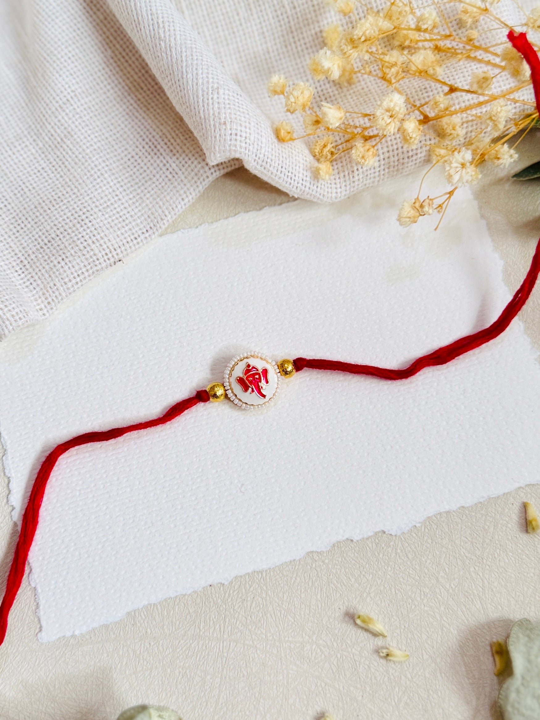 Shubh Ganesha Divine Bead Rakhi