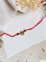 Om Flute Divine Bead Rakhi