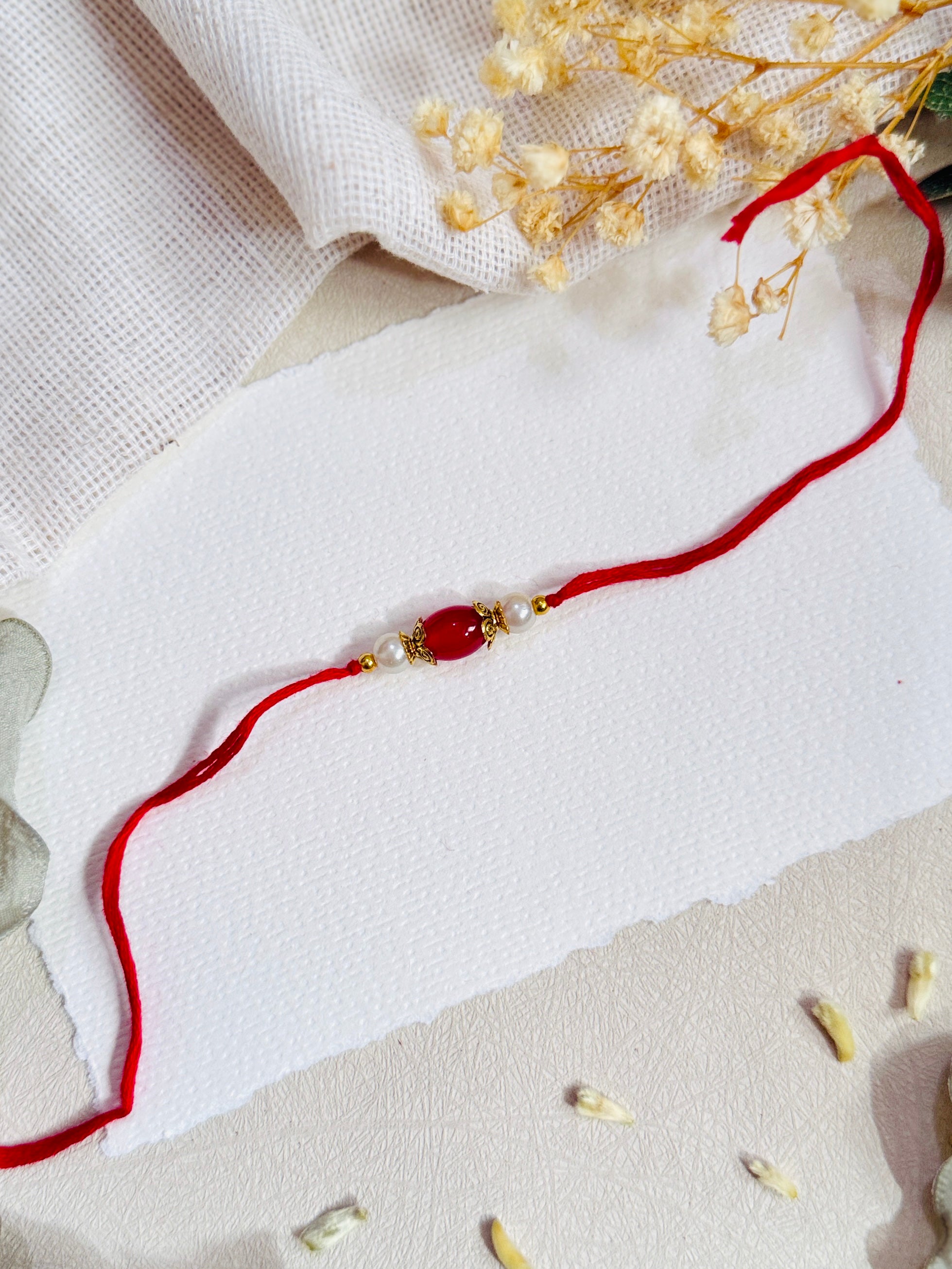 Oval Bead Divine Rakhi