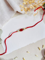 Oval Bead Divine Rakhi