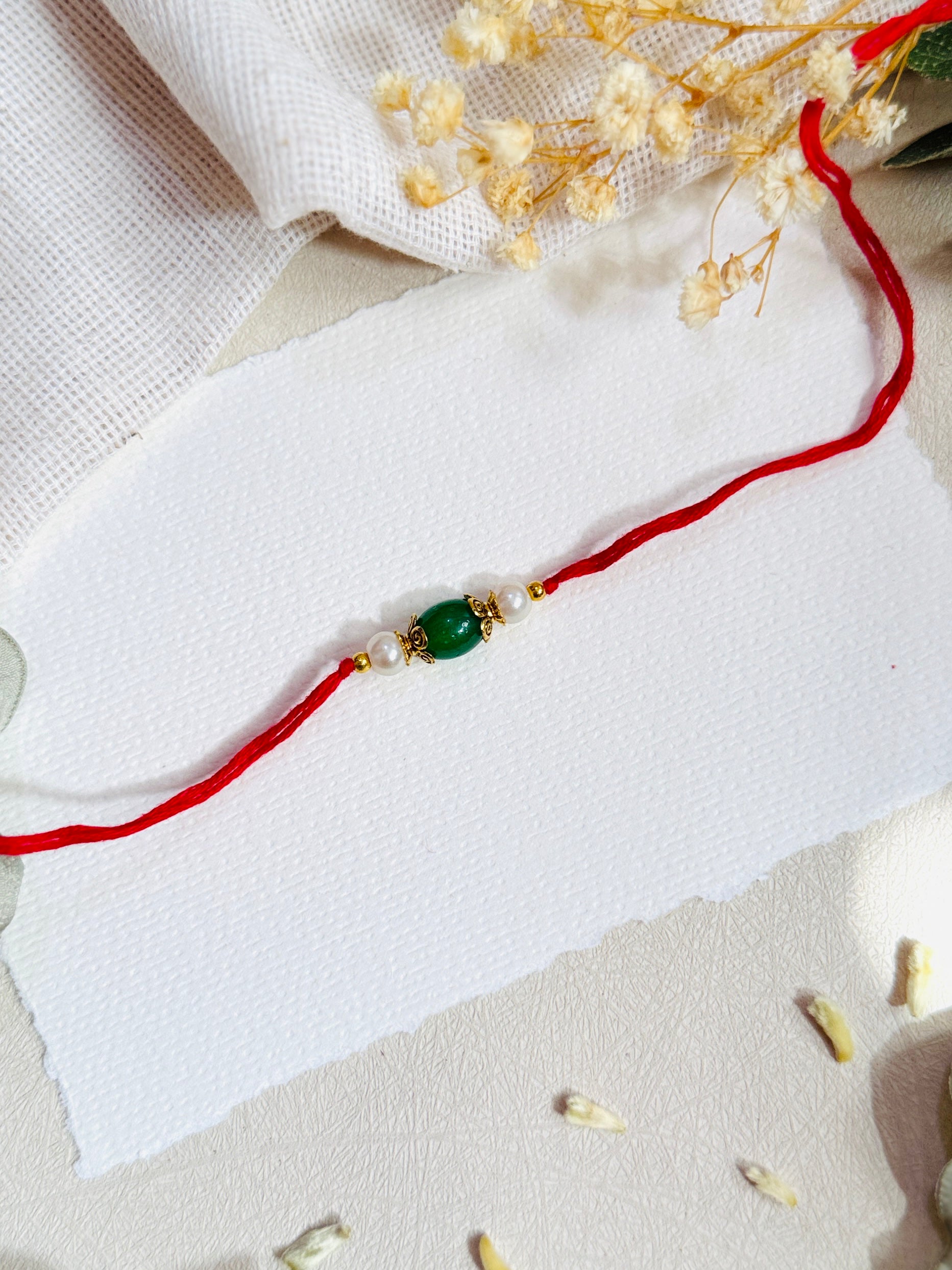 Oval Bead Divine Rakhi