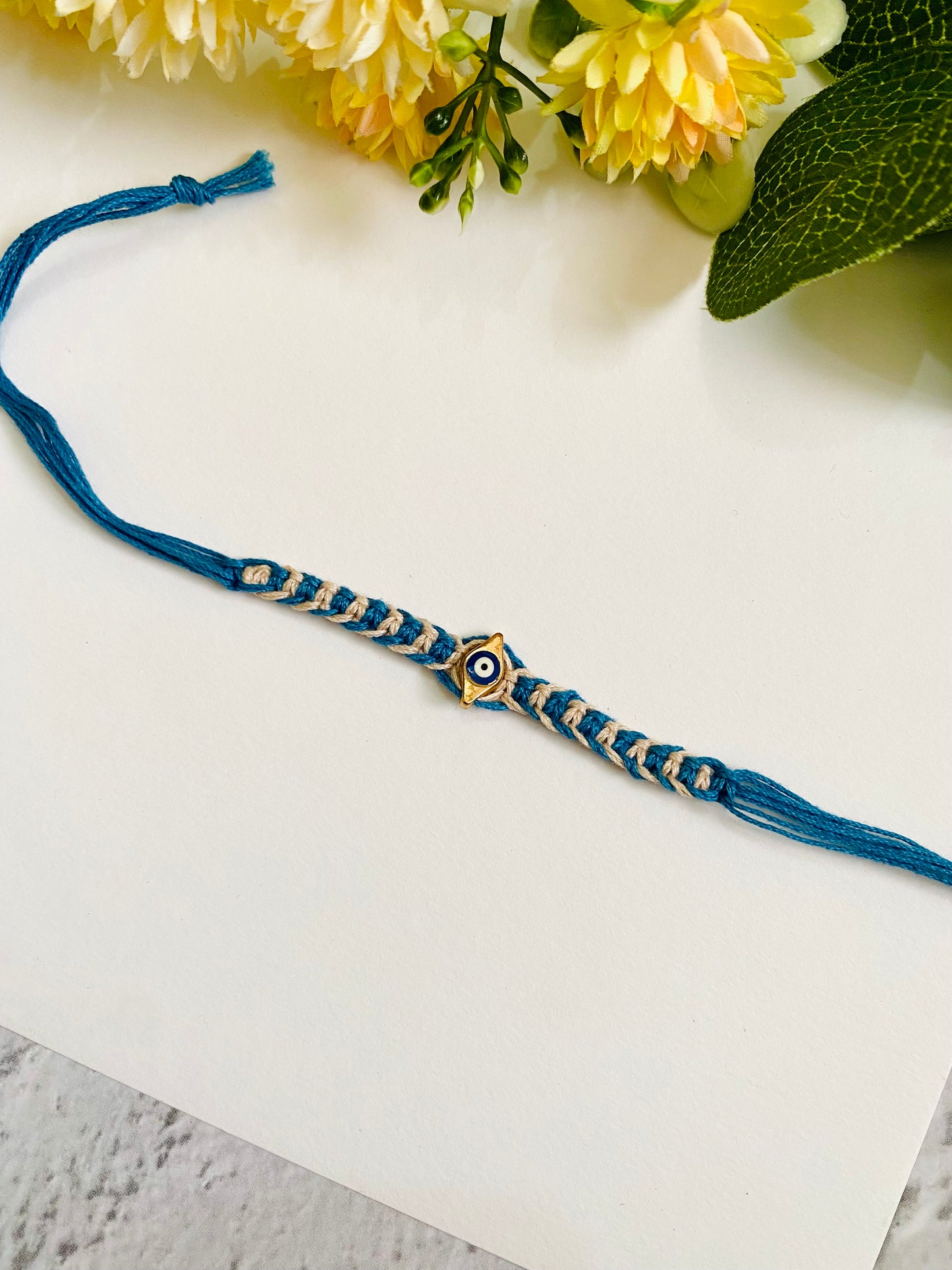 Golden Evil Eye Knotting Blue Band Bhai Rakhi
