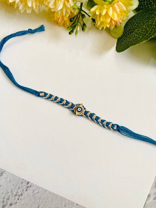 Golden Evil Eye Knotting Blue Band Bhai Rakhi