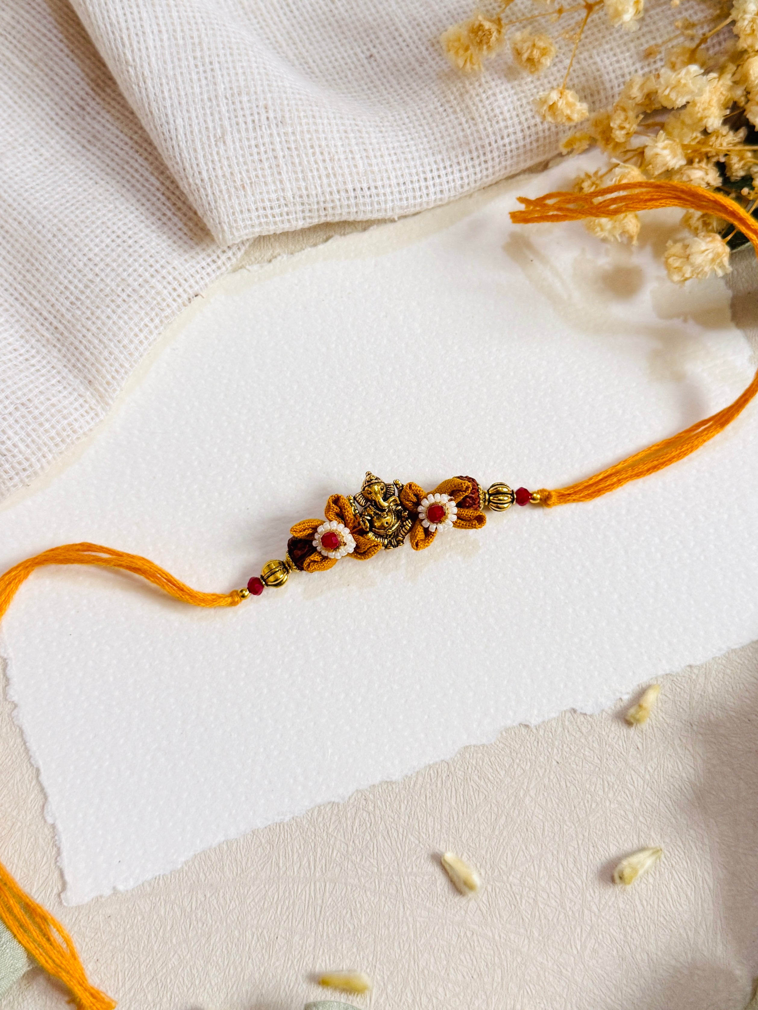 Ganesha And Flower Designer Bhai Rakhi