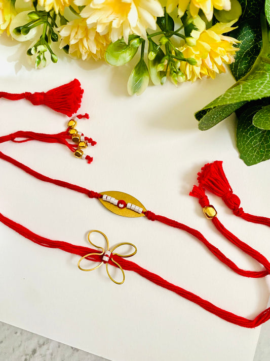 Golden Evil Eye And Butterfly Bhai Bhabhi Rakhi Set