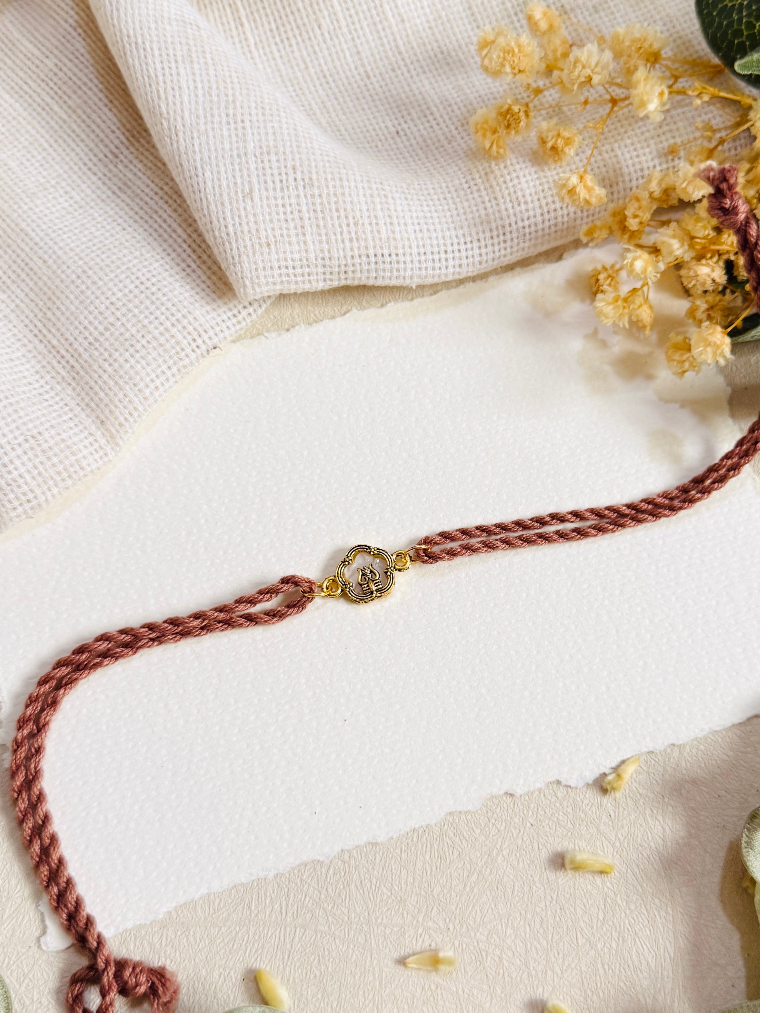 Gold And Mother of Pearl Bhai Rakhi