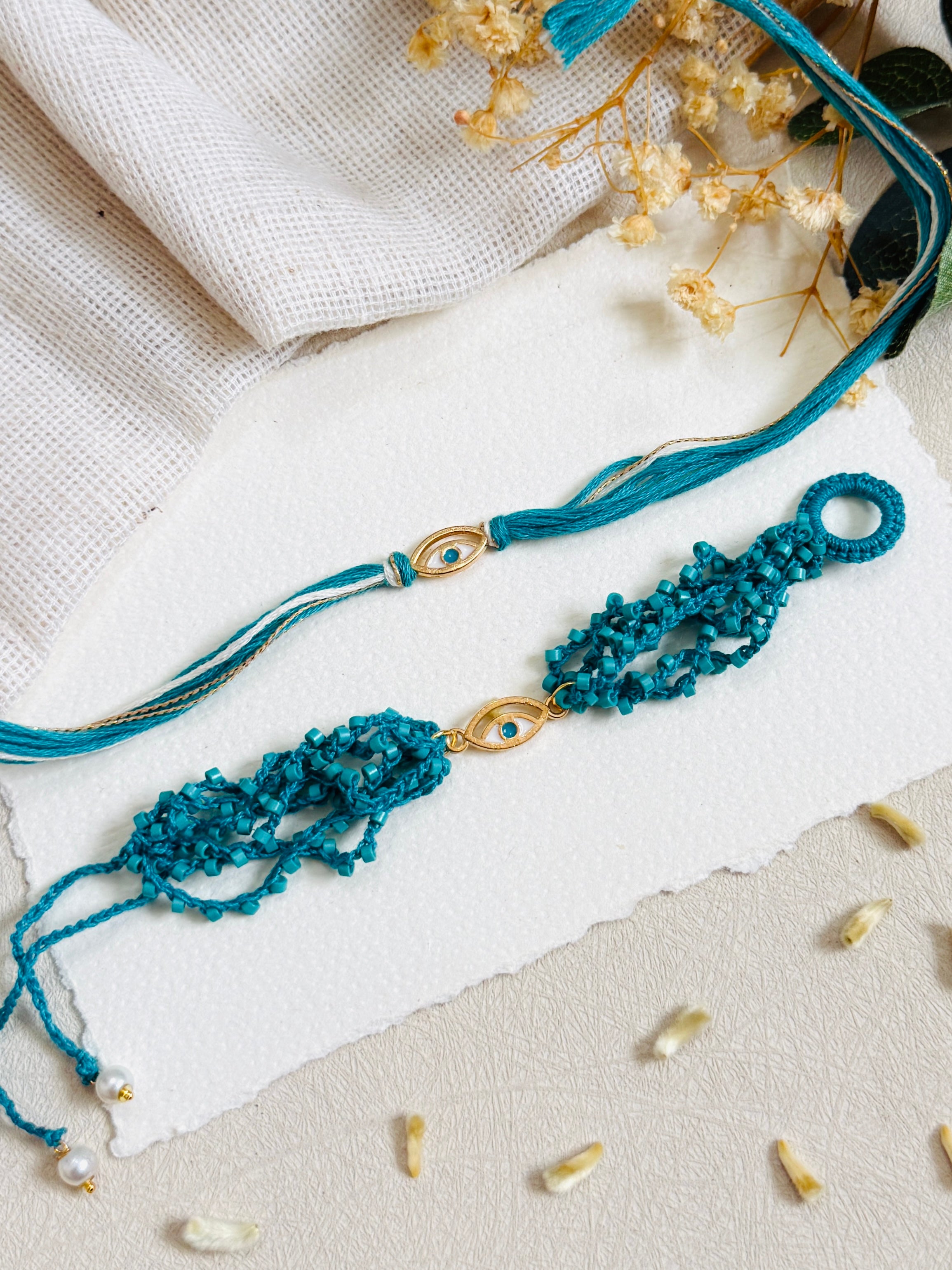 Golden Elegant Evil Eye Bhai Bhabhi Rakhi Set