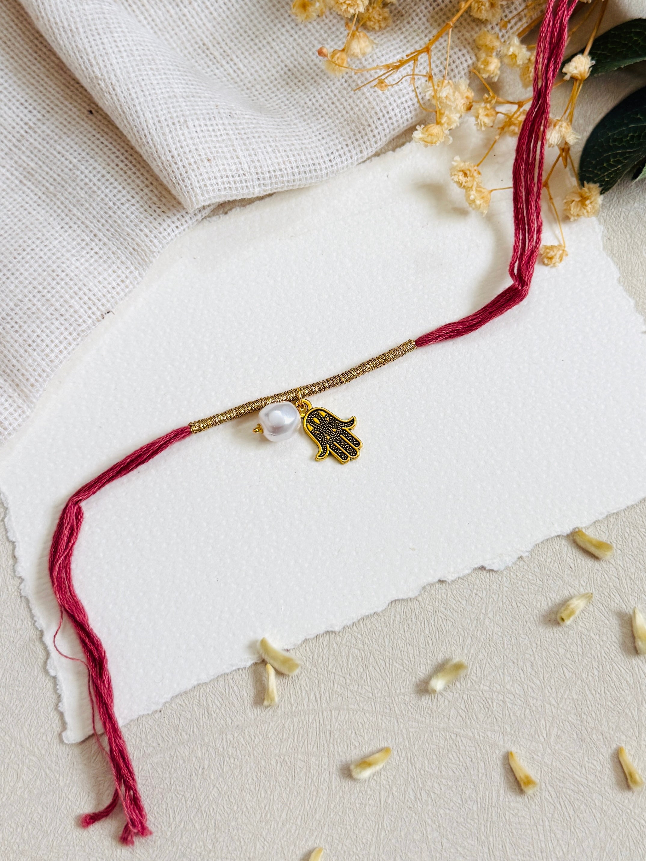 Pearl Hamsa Rakhi