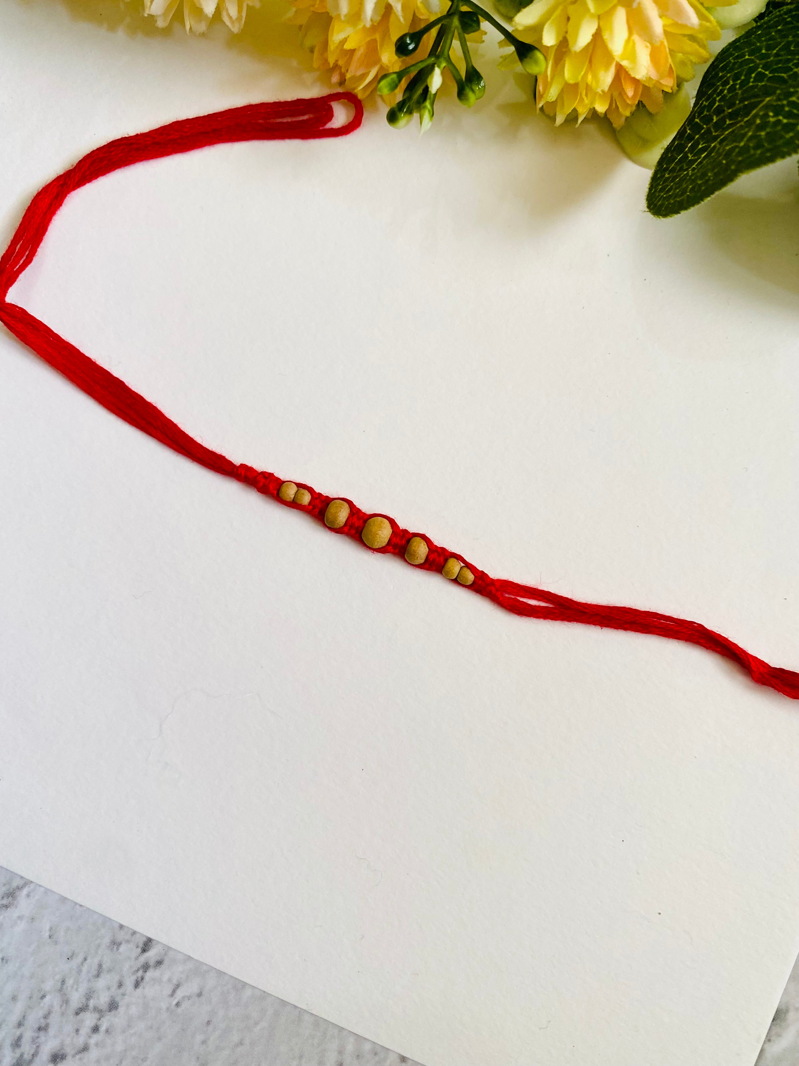 Divine Sukhad Beads Knotted Rakhi