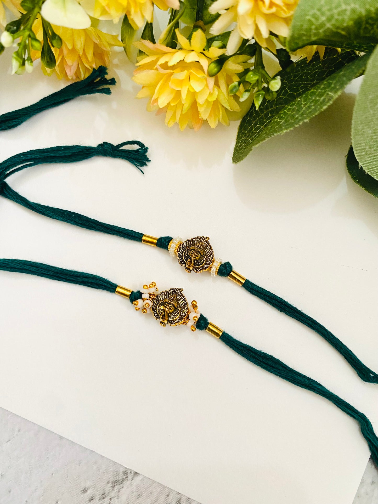 Leaf Ganesha pipe bead bhai bhabhi rakhi set