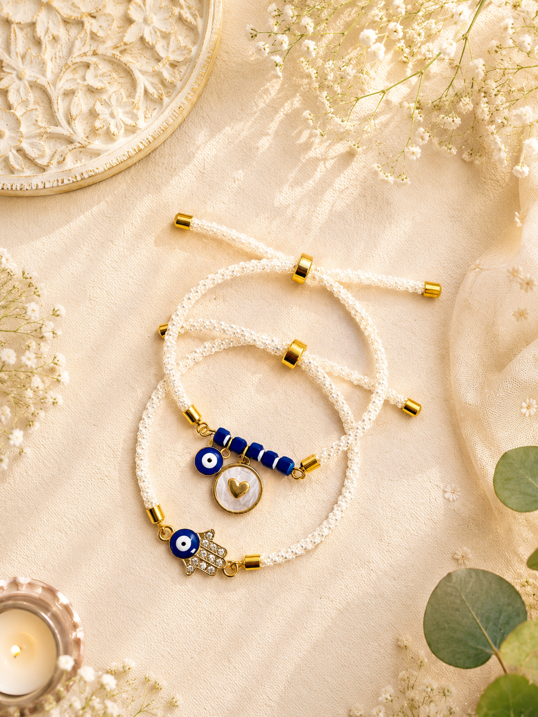 Humsa And Heart Evil Eye Bhai Bhabhi Rakhi Set