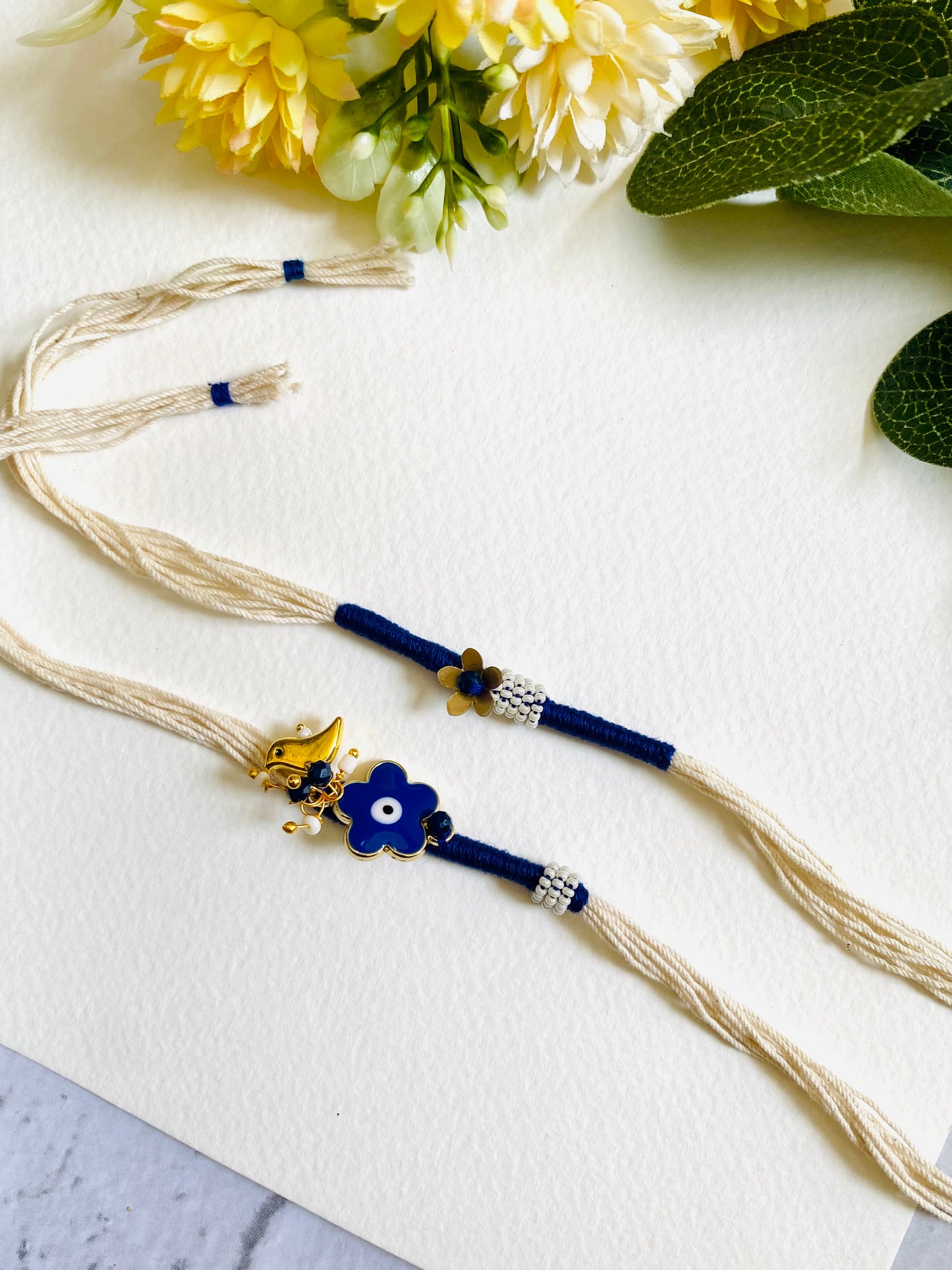 Flower Evil Eye Charm Bhai Bhabhi Rakhi Set