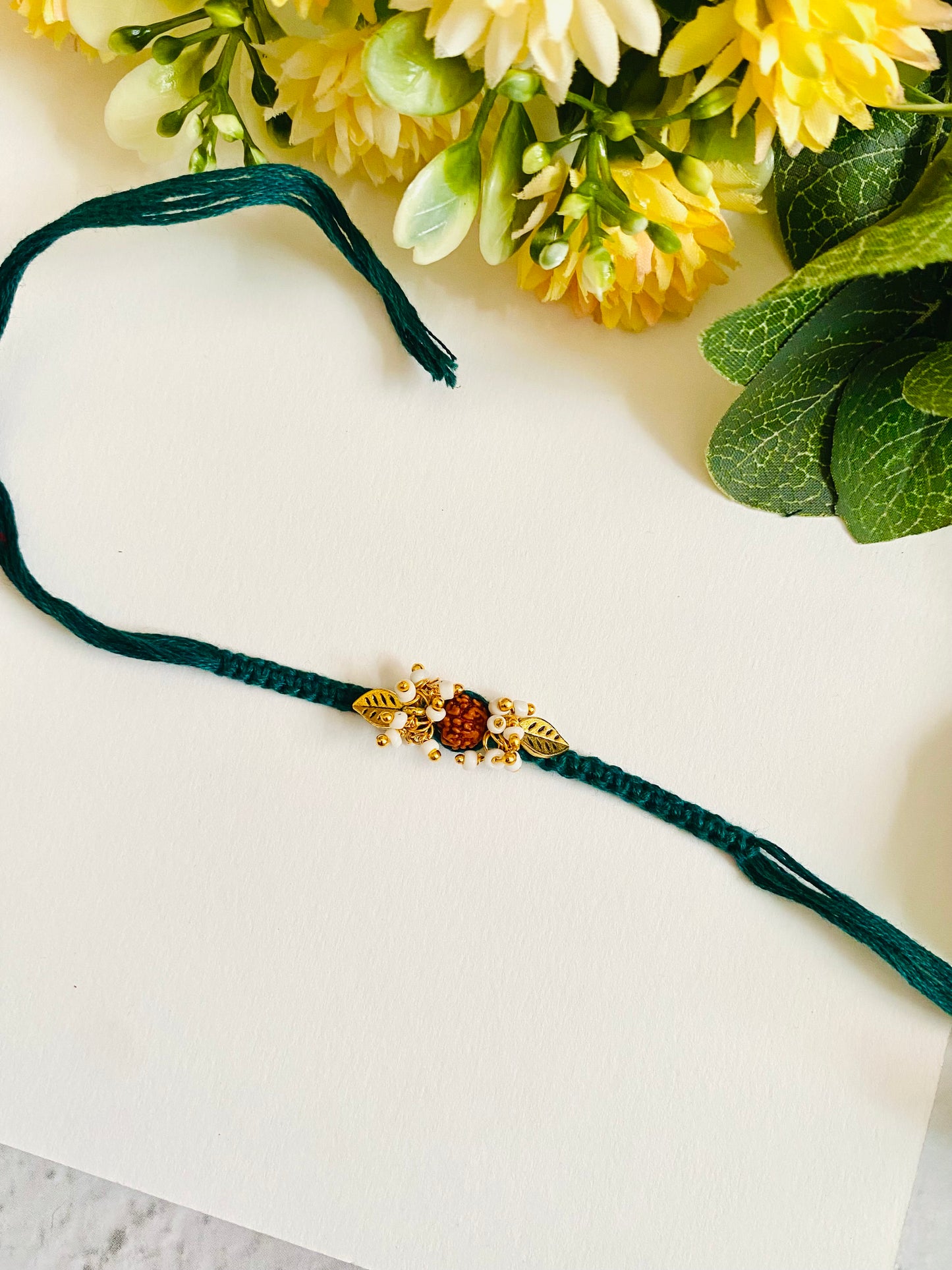 Ganesha knotting belt bhabhi rakhi