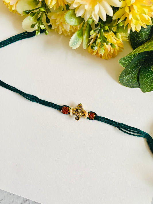 Ganesha knotting belt bhai rakhi