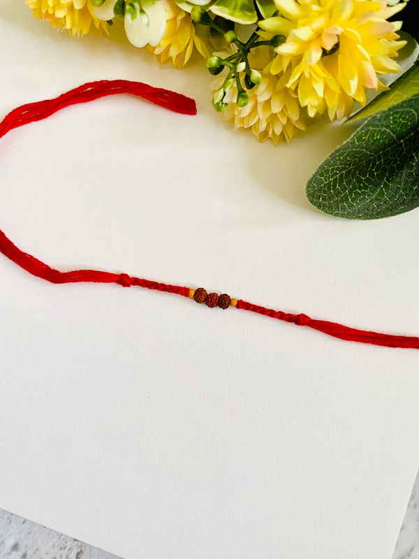 Three small rudraksh knotting belt bhai rakhi